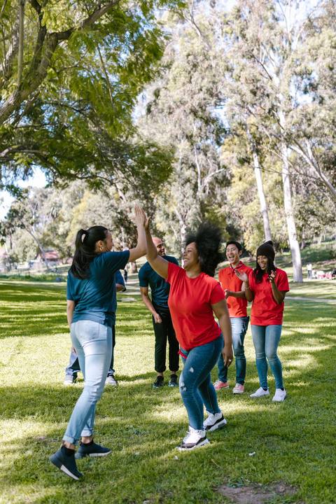 Friends playing a game in the park
